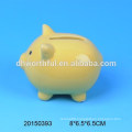 Cheap ceramic piggy bank in yellow